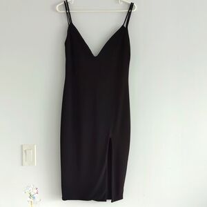 Black plunge slit dress